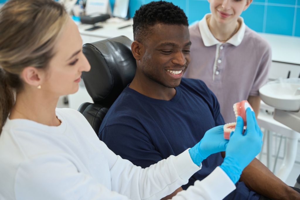 Smiling patient during a dental appointment at a Lemont, Illinois dental office.