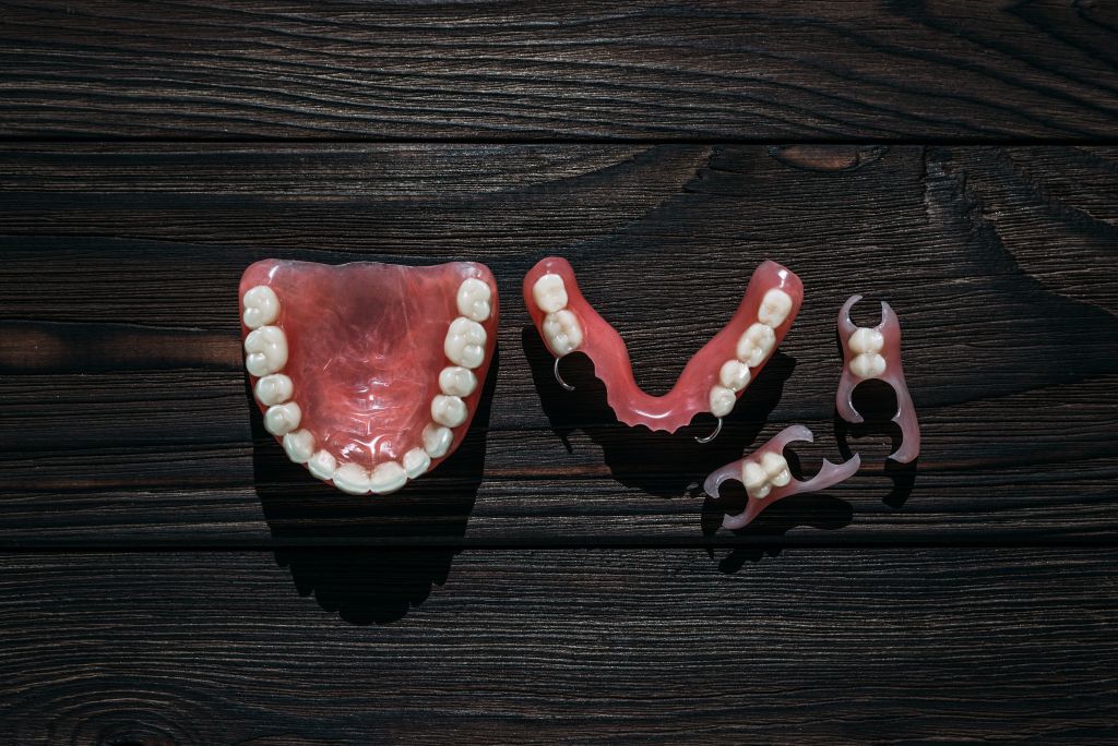 Full and partial dentures displayed at a Lemont, IL dental office.