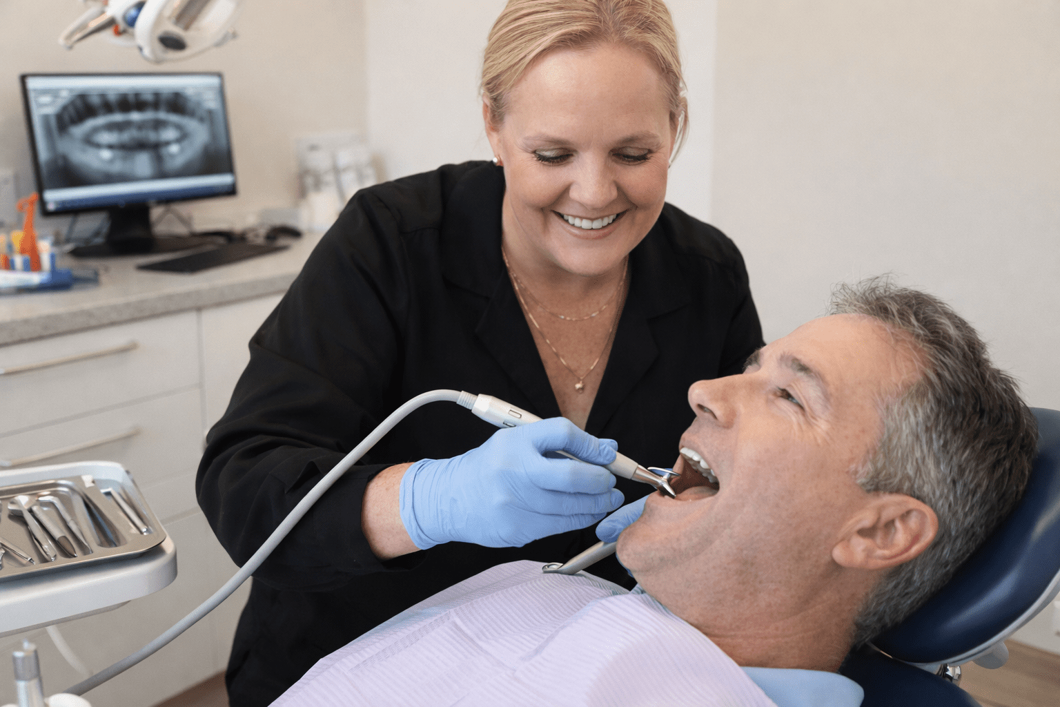 Patient having a dental filling consultation with dentist in Lemont, IL